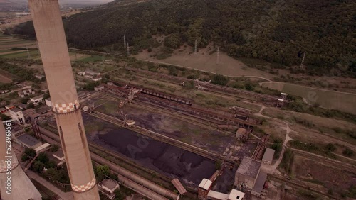 Aerial view of disaffected coal power plant, at sunset
