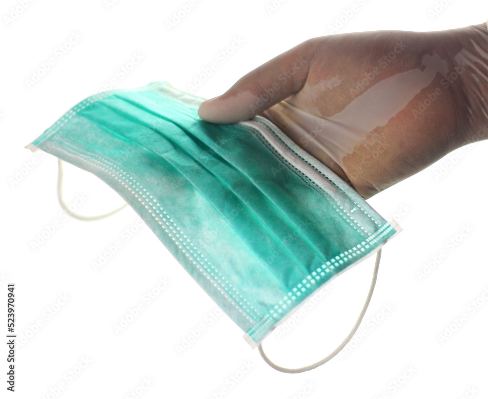 handing medical face masks for covid-19 virus protection on transparent ...