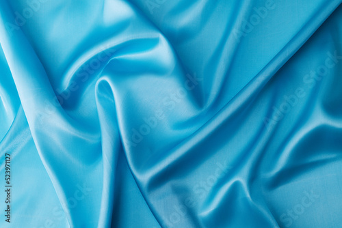 Close up of light blue silk background