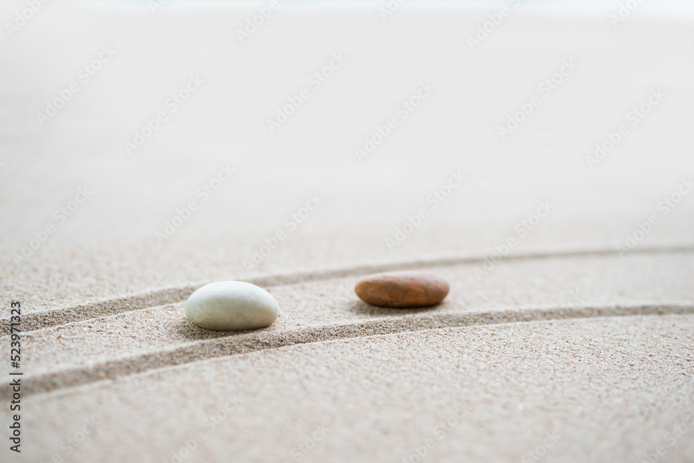 Japanese Zen Garden with Pebble with Line on Sand.mini Stone on Beach backgrond Top View and nobody.Ciircle Rock Balance Japan on nature.Simplicity Purity life.Relax Aromatherapy Spa and Yoga.Buddhism Japanese Zen Garden with Pebble with Line on Sand.mini Stone on Beach backgrond Top View and nobody.Ciircle Rock Balance Japan on nature.Simplicity Purity life.Relax Aromatherapy Spa and Yoga.Buddhism
