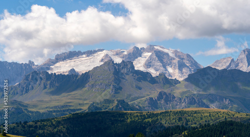 Amazing landscape to the Marmolada and its glaciers during summer time. Melting of glaciers due to global warming. It is the highest mountain of the Dolomites. Italian alps © Matteo Ceruti