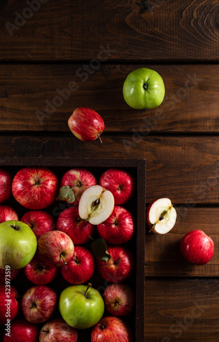 Ripe apples and one cut in half