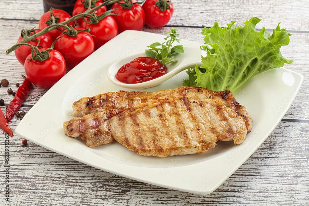 Grilled pork steak with ketchup Grilled pork steak with ketchup