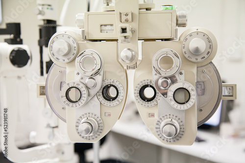 Phoropter, ophthalmic testing device in an optometrist's room photo