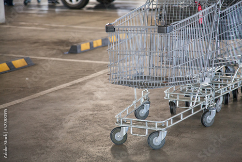 Shopping trolleys in undercover parking photo