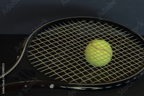 tennis racket with ball © AlexZlat