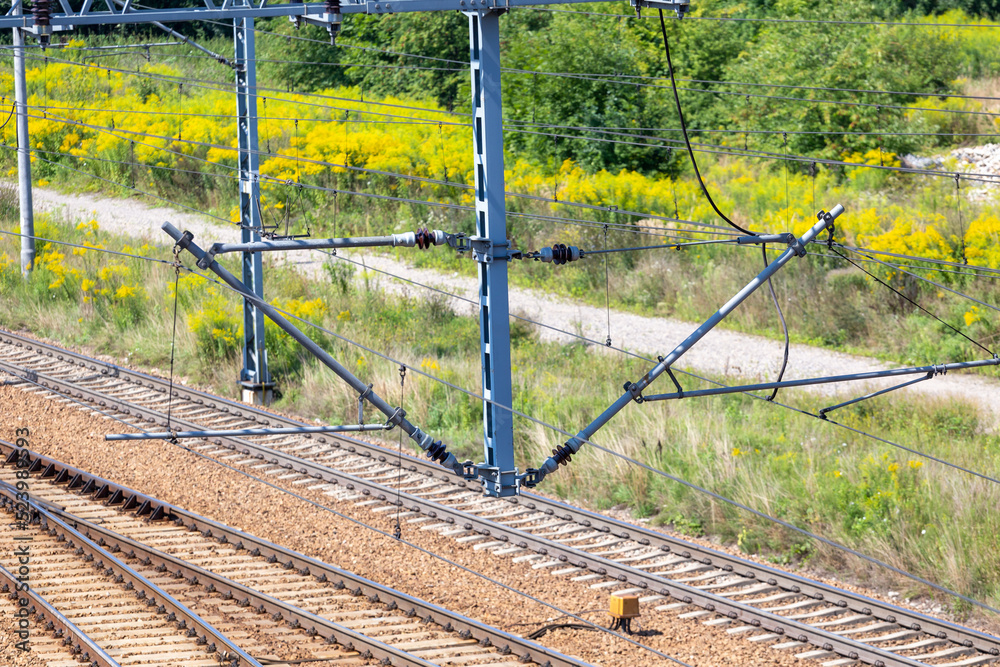 Fototapeta premium Electric traction over modern railway line