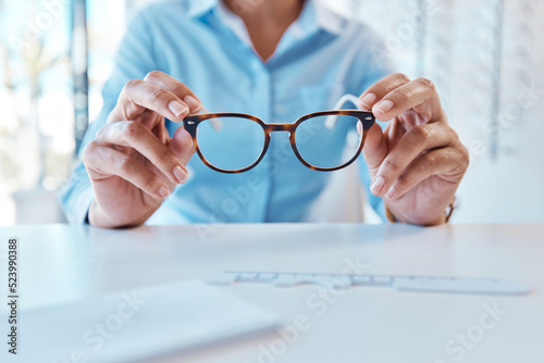 Glasses, eye care and eyewear or optometry eyeglasses for woman with disorders and myopia. Closeup hands of customer buying, purchasing and testing stylish prescription spectacles in clinic and shop