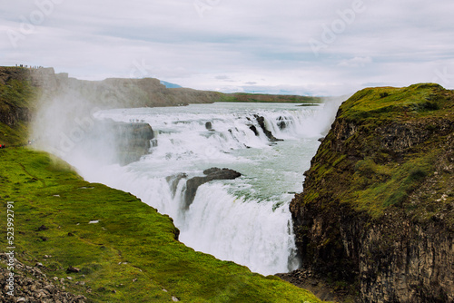 epic waterfall in Iceland mountains