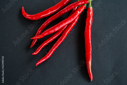 Red Chili Pepper Isolated On Black Background