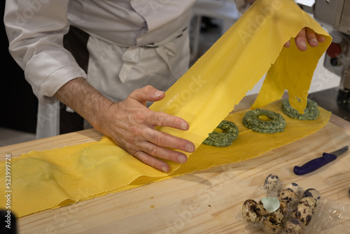 Preparation of Ravioli Italian Pasta with Spinach and Quail Eggs