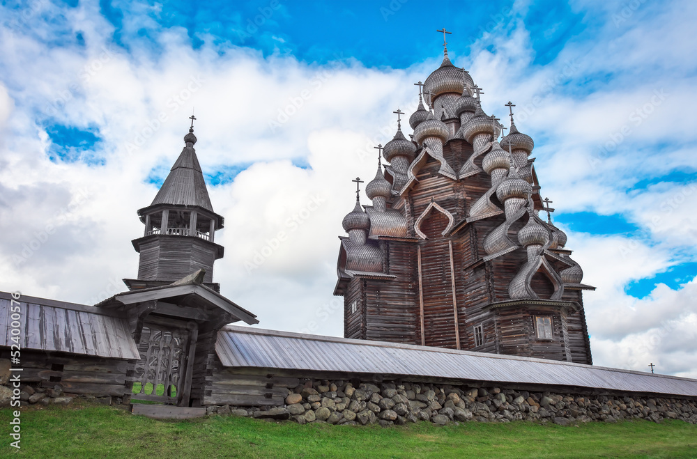 The wooden buildings of the ancient Russian architecture. The famous Church of the Transfiguration of the Lord after restoration. Kizhi island, Onega lake, Republic of Karelia.