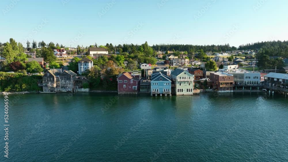 Aerial shot pushing towards Coupeville shops hanging out over the historic waterfront. Aerial shot pushing towards Coupeville shops hanging out over the historic waterfront.