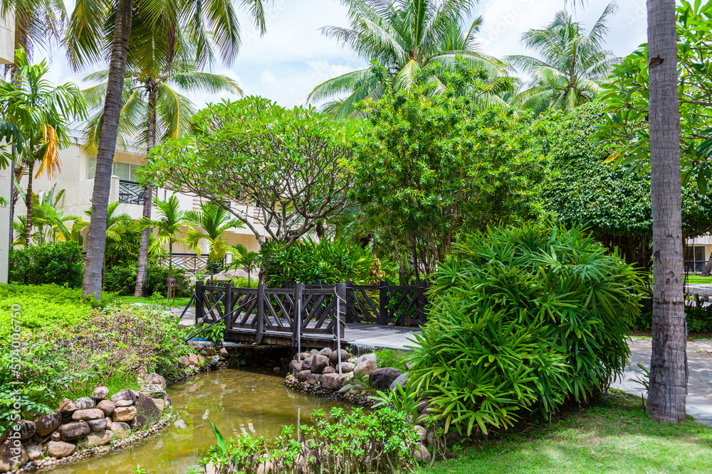 Rest on the shores of the Pacific Ocean in a comfortable luxury hotel. Walk on the bridge over the carps pond in a green garden