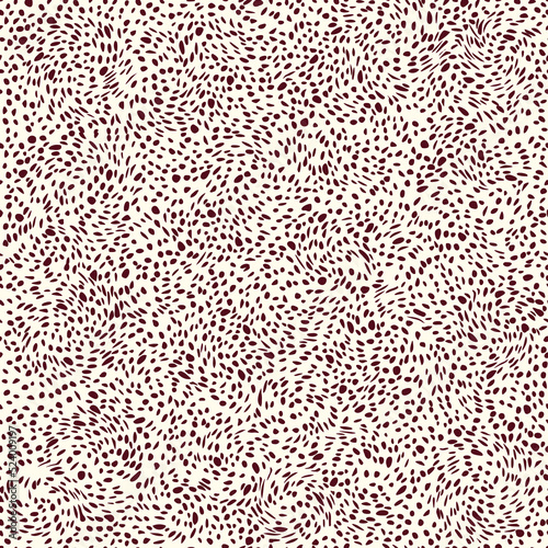Abstract vector seamless pattern of dark dots on white background.