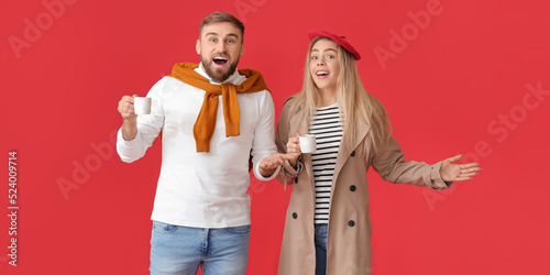Surprised young couple with...