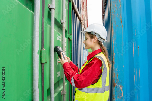 Woman Foreman Using Credit Card Swipe Machine for checking code of Cargo container before import exprot concept logistics transportation shipping, Lady Foreman checking Cargo 