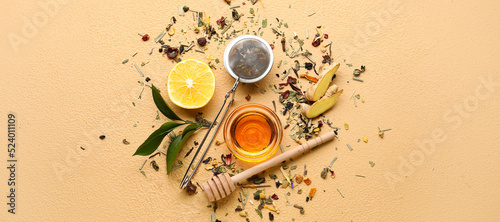 Composition with ingredients for tasty ginger tea on beige background, top view photo