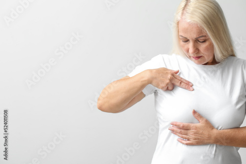 Mature woman suffering from...