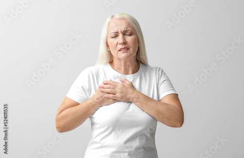 Mature woman suffering from...
