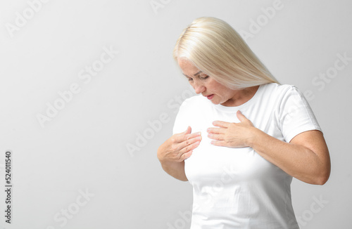 Mature woman suffering from...