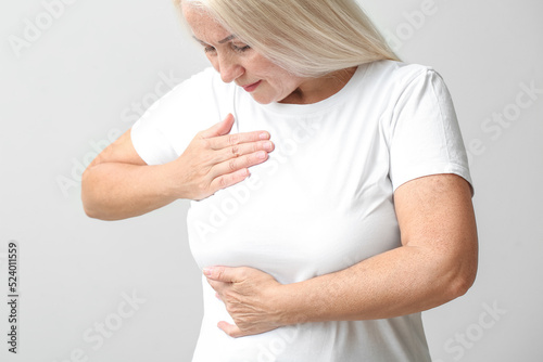 Mature woman suffering from...