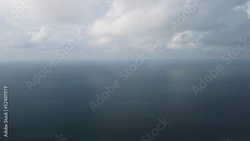 Wallpaper Mural Aerial view. Blue sky sun and fog over calm sea. The drone flies over foggy and fluffy clouds. Abstract aerial nature summer ocean sunset sea and sky background. Vacation, travel and holiday concept. Torontodigital.ca