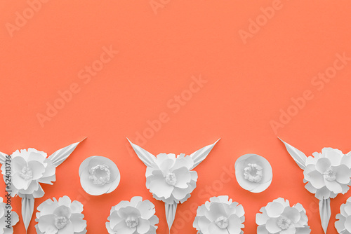 Paper flowers and leaves on...