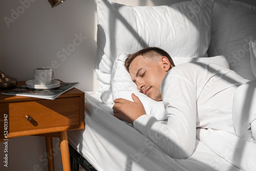 Handsome young man sleeping...