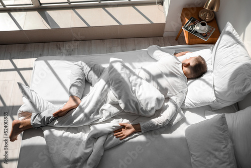 Handsome young man sleeping...