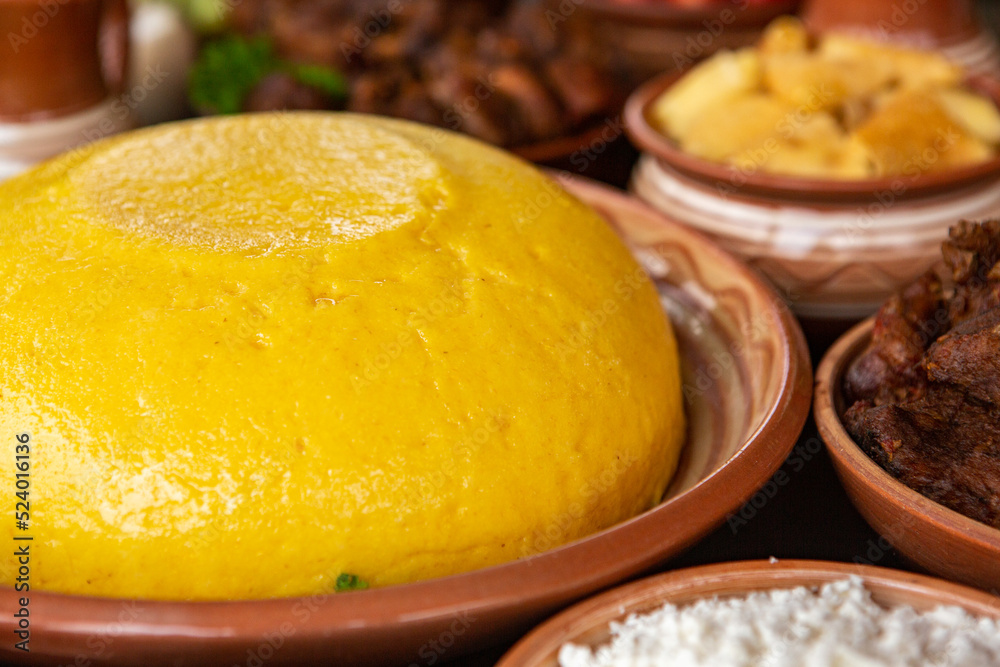 Homemade Romanian Food with polenta, meat, cheese and vegetables. Delicious corn porridge in clay dishes. Mamaliga or polenta, a traditional dish in Moldova, Hungary and Ukrainian cuisine.
Homemade Romanian Food with polenta, meat, cheese and vegetables. Delicious corn porridge in clay dishes. Mamaliga or polenta, a traditional dish in Moldova, Hungary and Ukrainian cuisine.