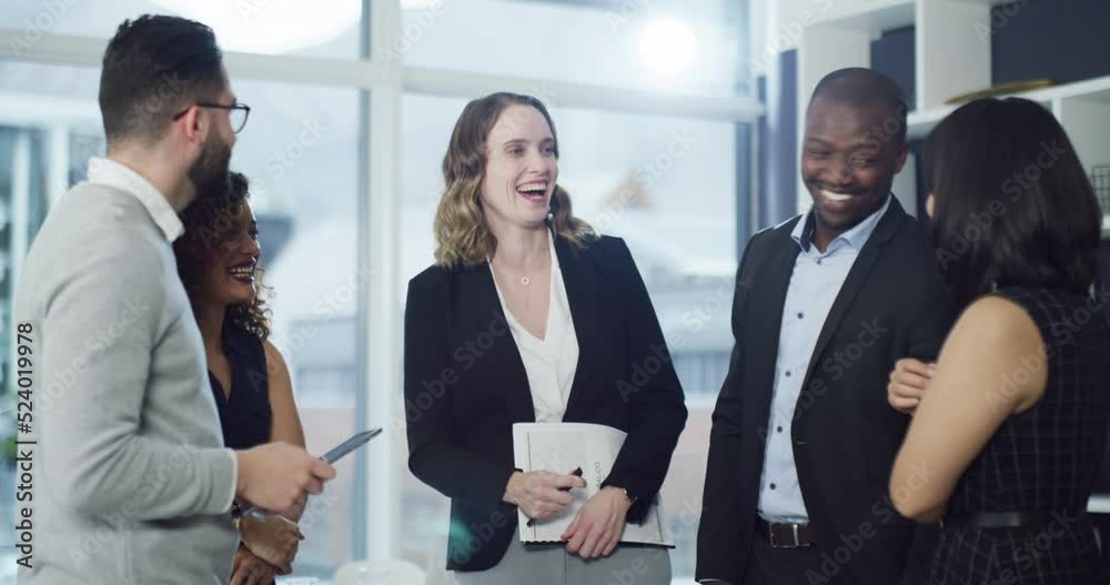 Cheerful, business people, networking and laughing in friendly conversation at modern corporate office. Team of executive, professional work colleagues talking together at formal company