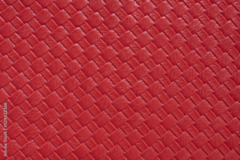 Red braided leather texture. Red texture for background. Red braided leather texture. Red texture for background.
