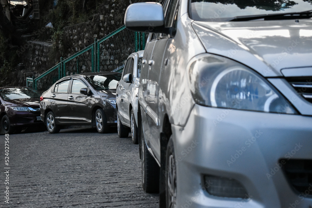January 1st 2020 Mussoorie Uttarakhand India. Cars parked uphill in the hill station of mussoorie, India.