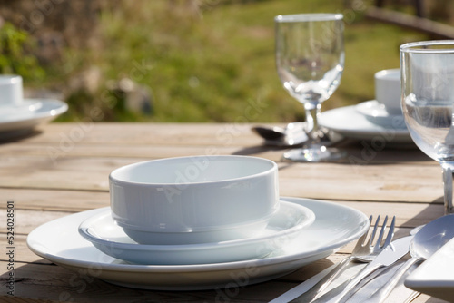 Warm Table Setting at a Garden in Daytime