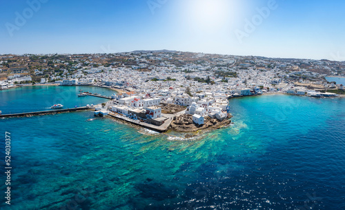 Beautiful, panoramic aerial view of Mykonos town with white buildings and turquoise sea during summer time, Cyclades, Greece