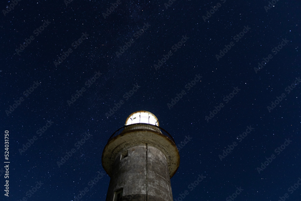 Working beacon and starry sky
