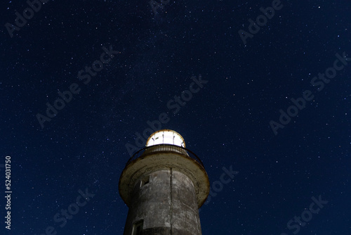 Working beacon and starry sky