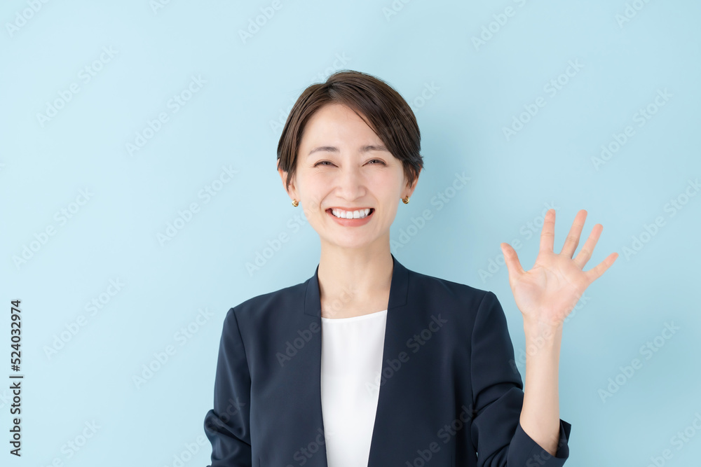 ビジネス・女性・ブルーバック ビジネス・女性・ブルーバック