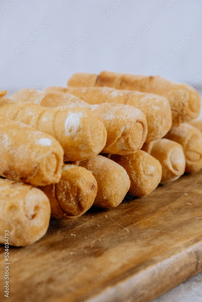 Fried tequeños, fingers stuffed with salty artisanal cheese, typical Venezuelan and Latin American food