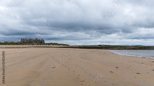 panorama landscape of Doughmore Bay and Beach with the Trump International Golf Club hotel in the background