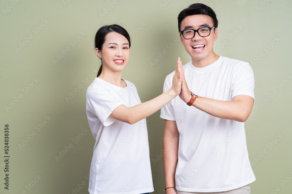 Photo of Asian couple on background Photo of Asian couple on background