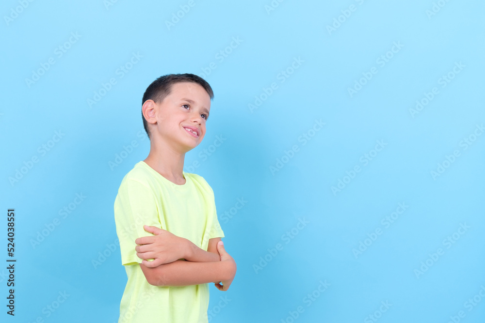 8 year old boy thoughtfully looking to one side 8 year old boy thoughtfully looking to one side