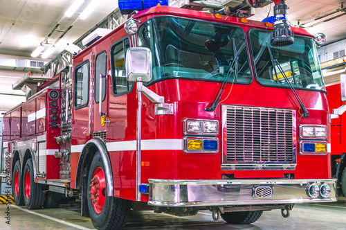 A fire truck with a retractable ladder for extinguishing fires at a height. A fire truck for the delivery of firefighters to the place of fire and the supply of extinguishing agent for extinguishing.