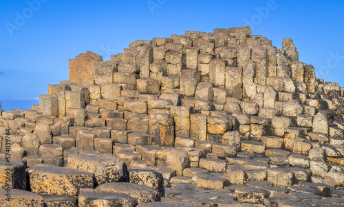 Beautiful Exposure of Giant s Causeway UNESCO World Heritage Site  is an area of about 40 000 interlocking hexagonal basalt columns  the result of an ancient volcanic fissure eruption. It is located i