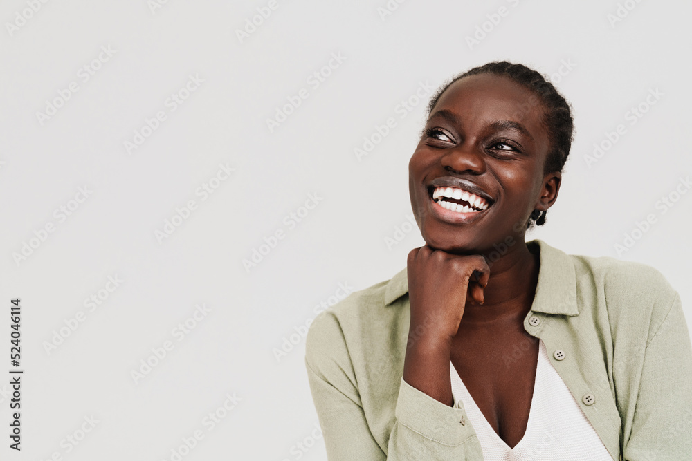 Fototapeta premium Young beautiful happy smiling african woman with braided hair