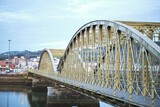 metallic bridge over river. 