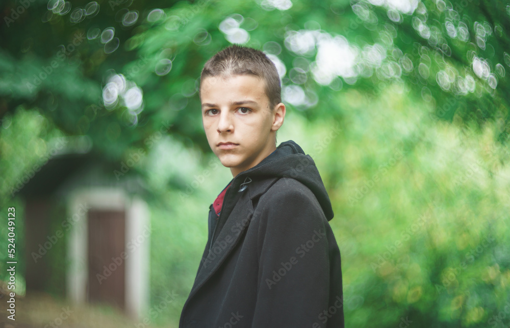 Portrait of a sad boy outside in nature Portrait of a sad boy outside in nature