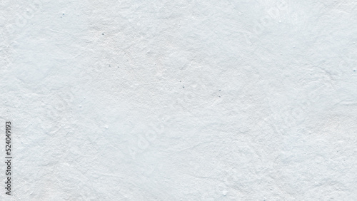 White cement wall concept. Surface of the white stone texture rough, gray white tone. There is a blank space for text. White marble texture. White paper texture