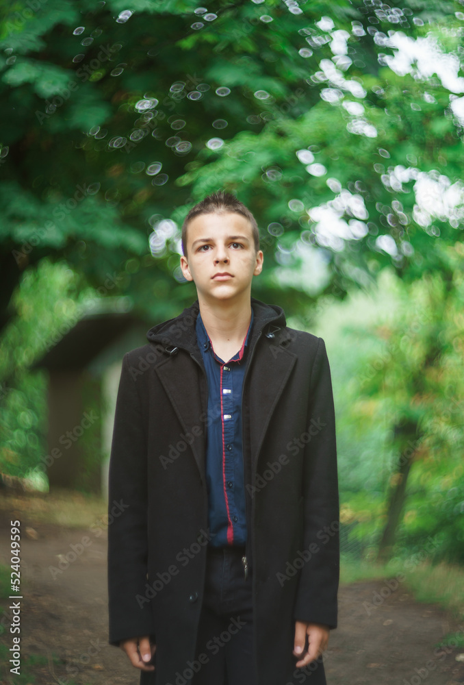 Portrait of a sad boy outside in nature Portrait of a sad boy outside in nature